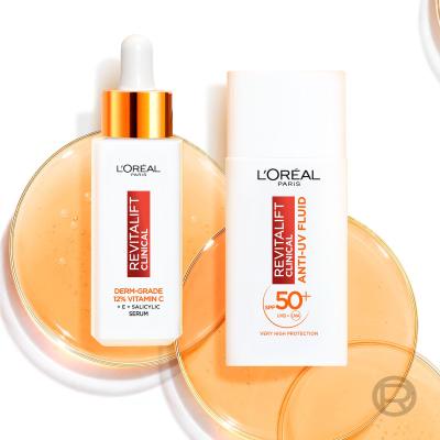 L&#039;Oréal Paris Revitalift Clinical Pure 12% Vitamin C Zestaw serum Revitalift Clinical Vitamin C Serum 30 ml + krem do twarzy na dzień Revitalift Clinical Vitamin C Anti-UV Fluid SPF50 50 ml