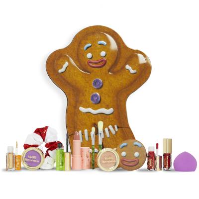 Makeup Revolution London Shrek Gingy 12 Days Advent Calendar Zestaw cienie do powiek 2 sztuki + rozświetlacz 1 sztuka + błyszczyk do ust 2 sztuki + pomadka 1 sztuka + róż do policzków 1 sztuka + żel do brwi 1 sztuka + pędzel 2 sztuki + gąbeczka do aplikacji make-upu 1 sztuka + lusterko 1 sztuka + gu